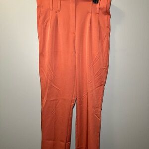 orange high-waisted pants